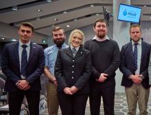 RNLI senior lifeguard Cameron Jacobie, Thomas McGinn, Emily Craven, Niall Robinson and RNLI helm Michael Stannard. Oz Nelson is not pictured.  Credit: Connor Wray